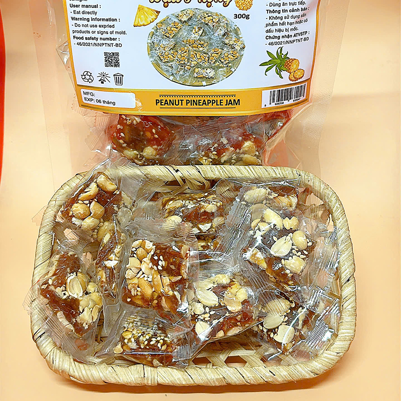 23380_z6125808197330-b8aabbf3acdffef58e7171ad0f0f625a_20241214103019-2.jpg Mứt Khóm Đậu Phộng Túi Zip 300g - MKDPTZ