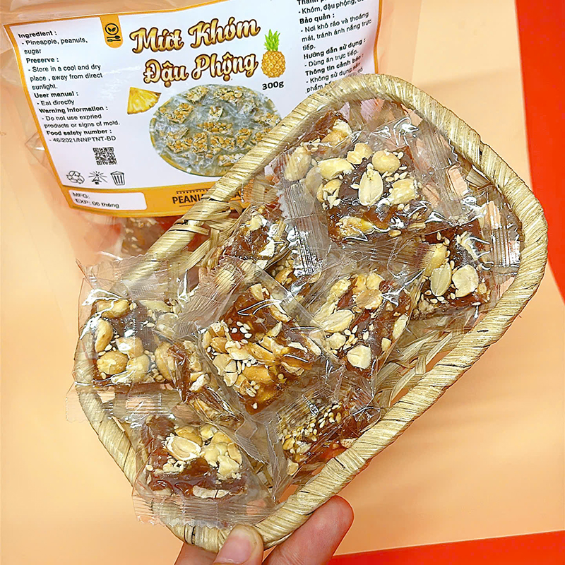 23380_z6125808228071-73f5cdb8e9ce1400dec4446072cd9b79_20241214103020-2.jpg Mứt Khóm Đậu Phộng Túi Zip 300g - MKDPTZ