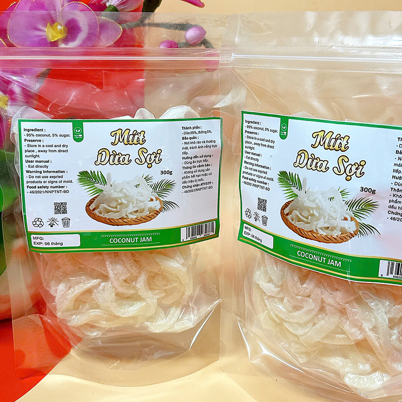 23383_z6129056898155-e66b94a20a4156ceddab8cd47df1dc22_20241214124302-2.jpg Mứt Dừa Sợi Túi Zip 300g - MDNMHCK
