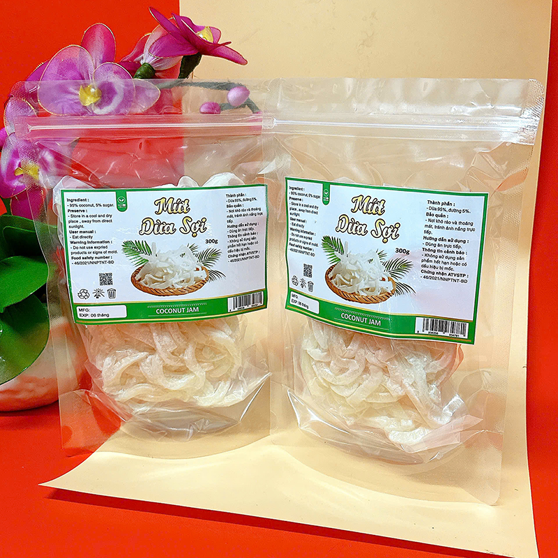 23383_z6129056912251-f9947e6cff752c9108ad35bb3d383c6a_20241214124301-2.jpg Mứt Dừa Sợi Túi Zip 300g - MDNMHCK