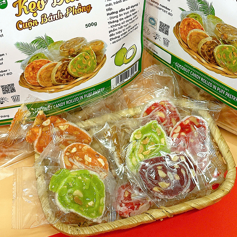 25875_z6125813347626-43a1f885918867730cdf9ca5875b4f3f_20241214151018-3.jpg Kẹo Dừa Cuộn Bánh Tráng Mix 7 Vị Thơm Ngon - Túi Zip 500g - KDCNP500