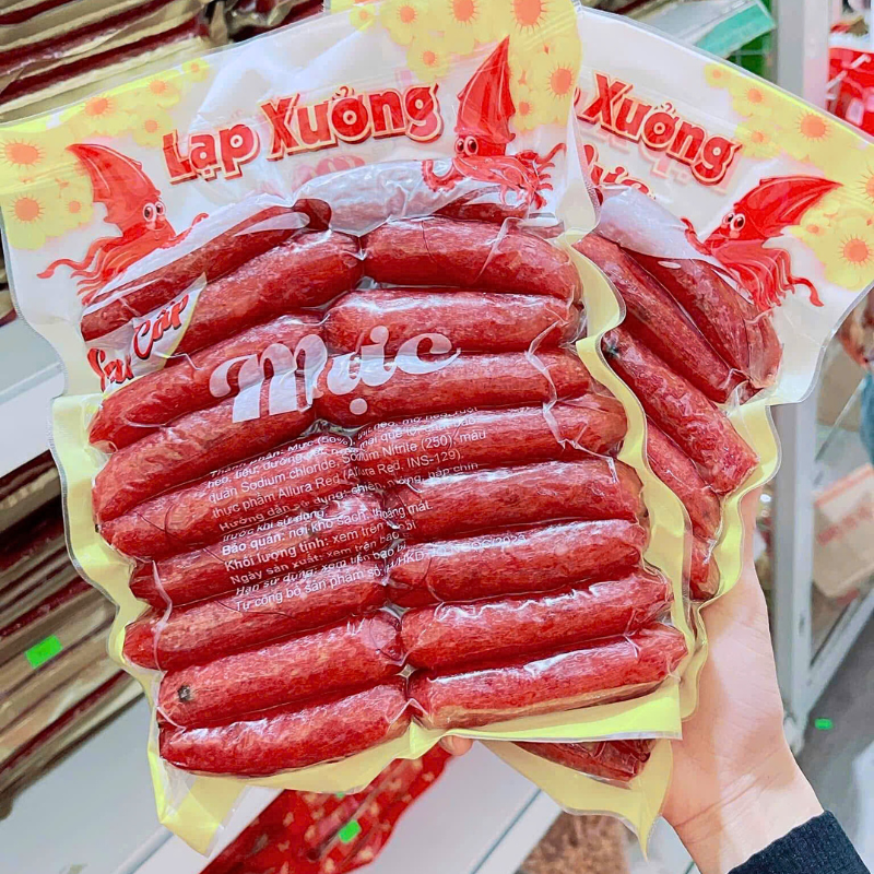 26707_3_20250905183431-4.png Lạp Xưởng Mực Thơm Ngon Túi 500g - LXMT500G