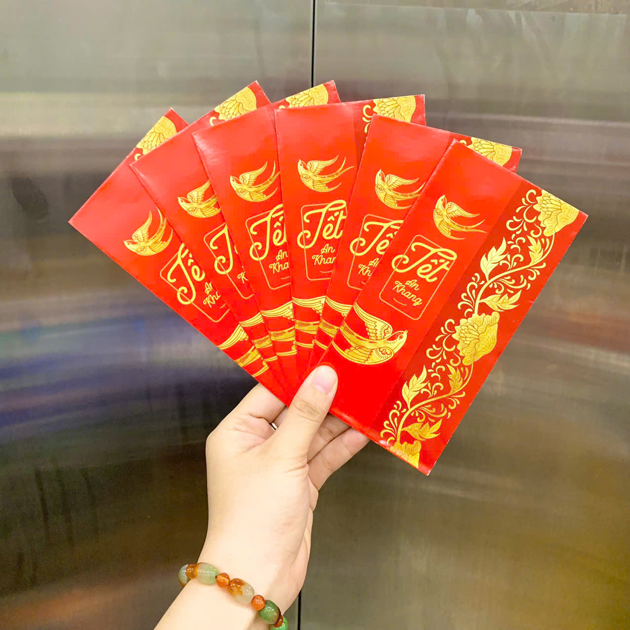 26988_z7271017459435-3a9b4d8ab940ae6fd3ffce658f829cd1_20251128155223.png Combo 100 Bao Lì Xì Tết Bính Ngọ 2026 - Khách Chọn Tối Đa 10 mẫu - LIXI2026